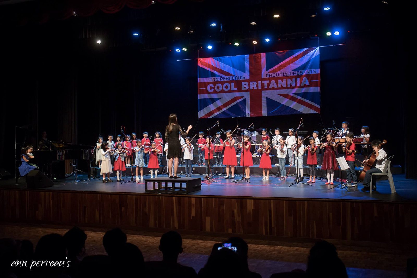 Ann Perreau's string orchestra performing at the Cool Britannia concert